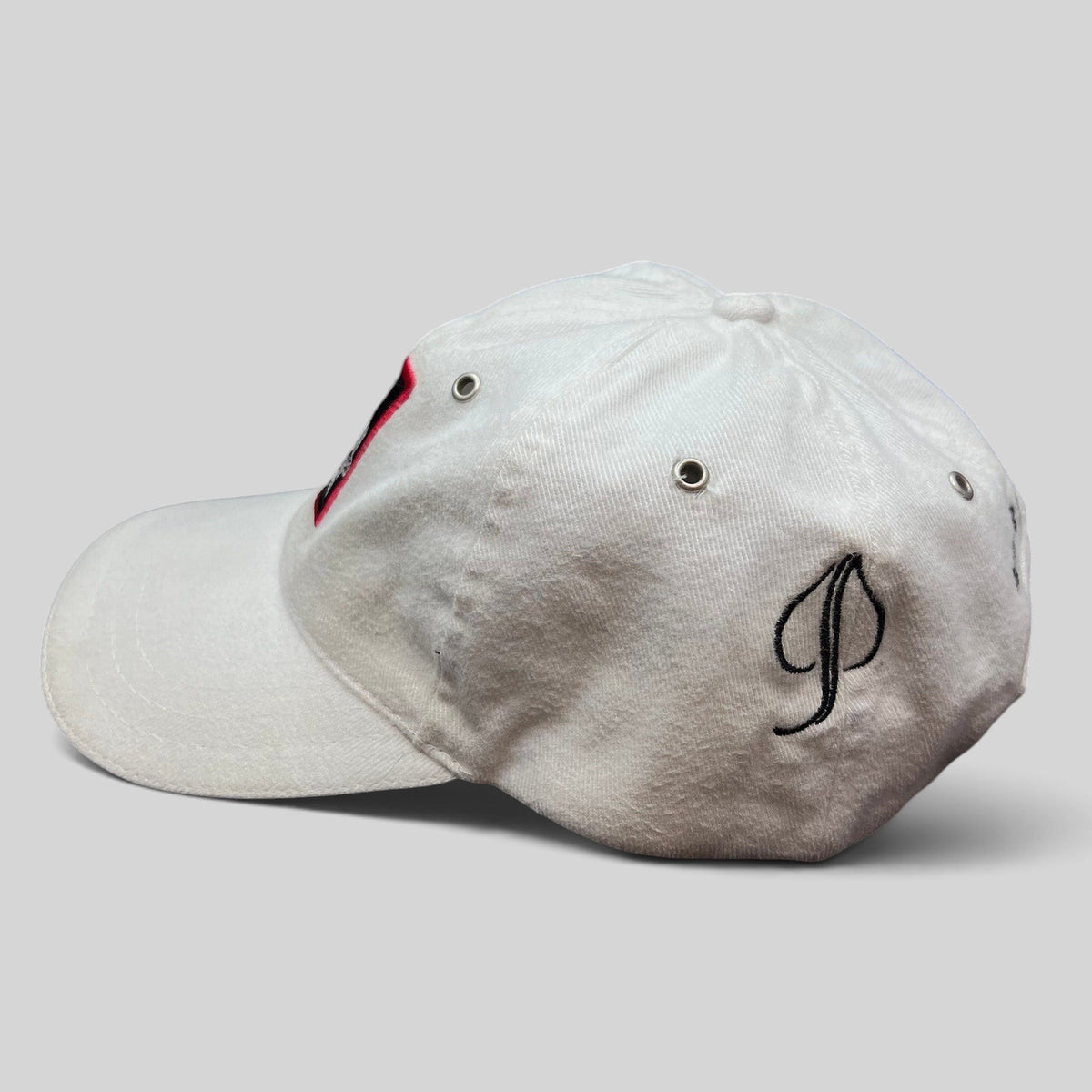 Raree Finds vintage white Audi 24 HRS of Aspen cotton strapback hat with side embroidery and metal eyelets