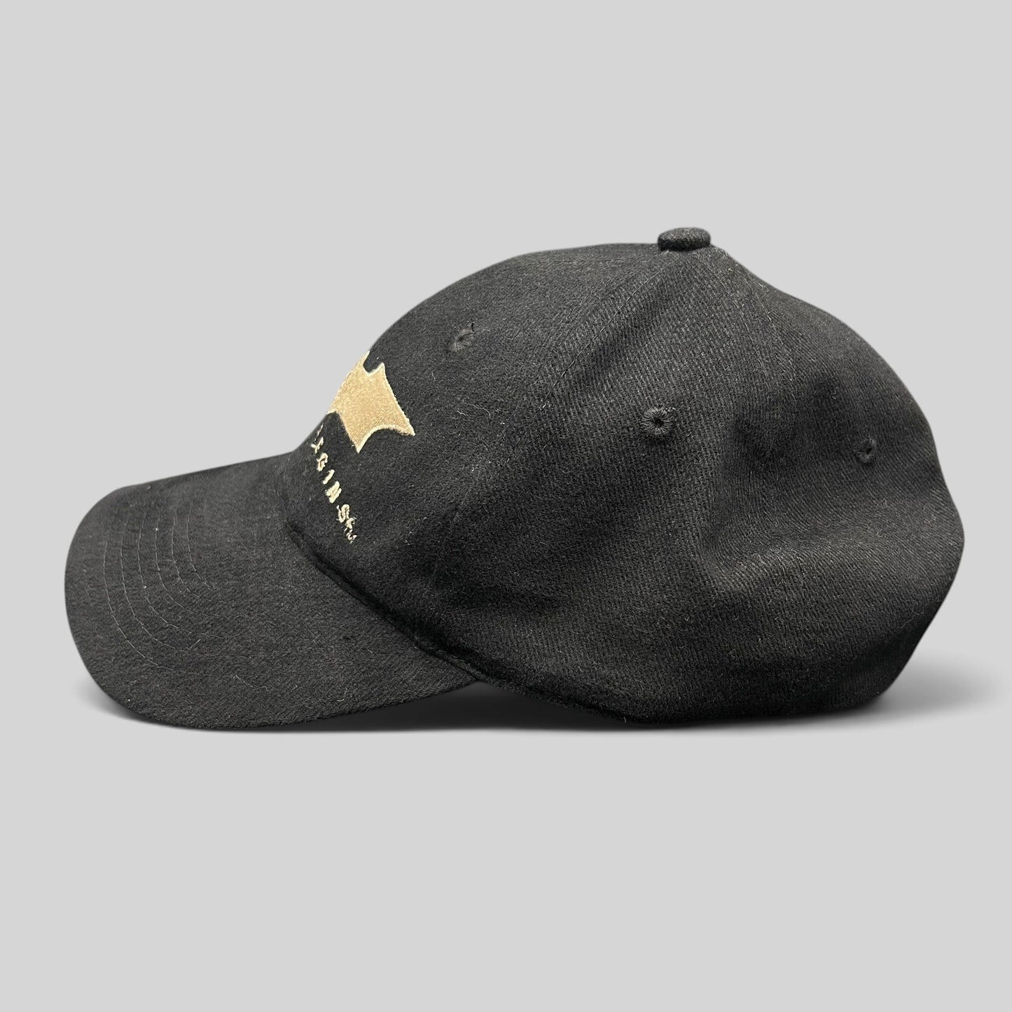 Raree Finds vintage 2005 Batman Begins black cotton strapback hat with gold embroidered bat logo and film title