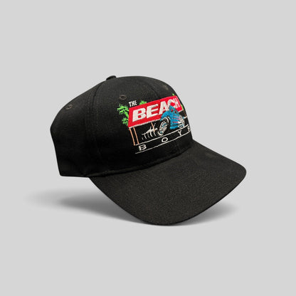 Raree Finds vintage 1990s black Beach Boys snapback hat with embroidered Little Deuce Coupe hot rod graphic