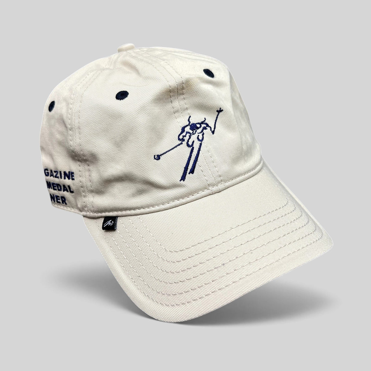 Raree Finds vintage beige cotton strapback hat with embroidered skier logo and Ski Magazine Gold Medal Winner text