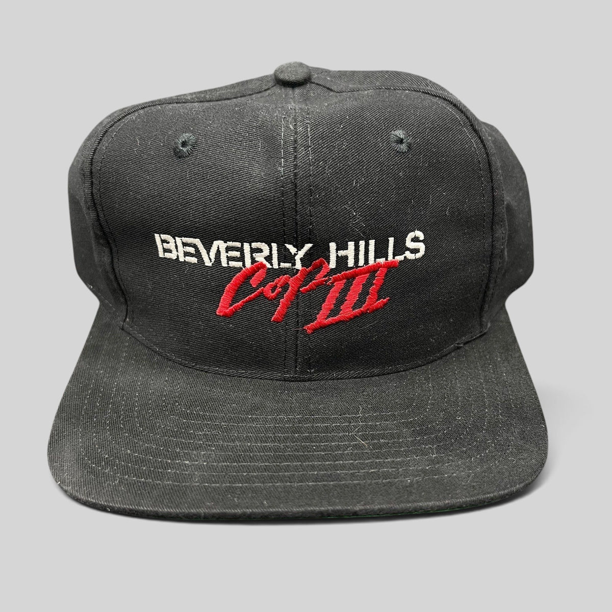 Raree Finds vintage 1994 Beverly Hills Cop III movie promo snapback hat in black with red and white embroidery