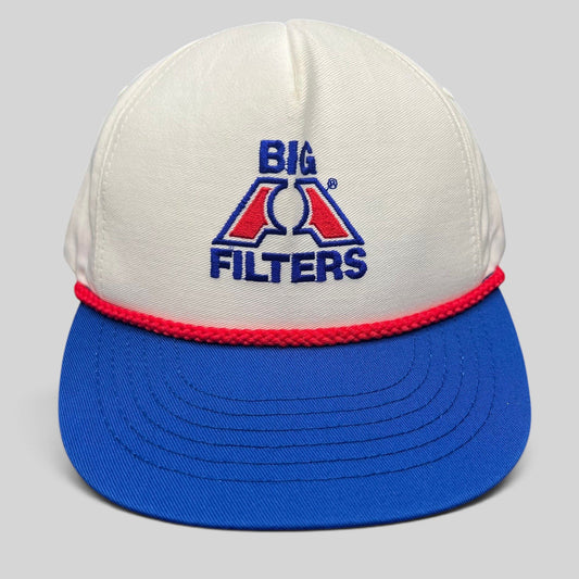Raree Finds vintage Big A Filters snapback hat in red, white, and blue with embroidered logo and front rope detail.