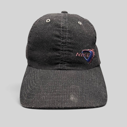 Raree Finds vintage black corduroy Nike strapback hat with red and blue embroidered triangular logo on the front