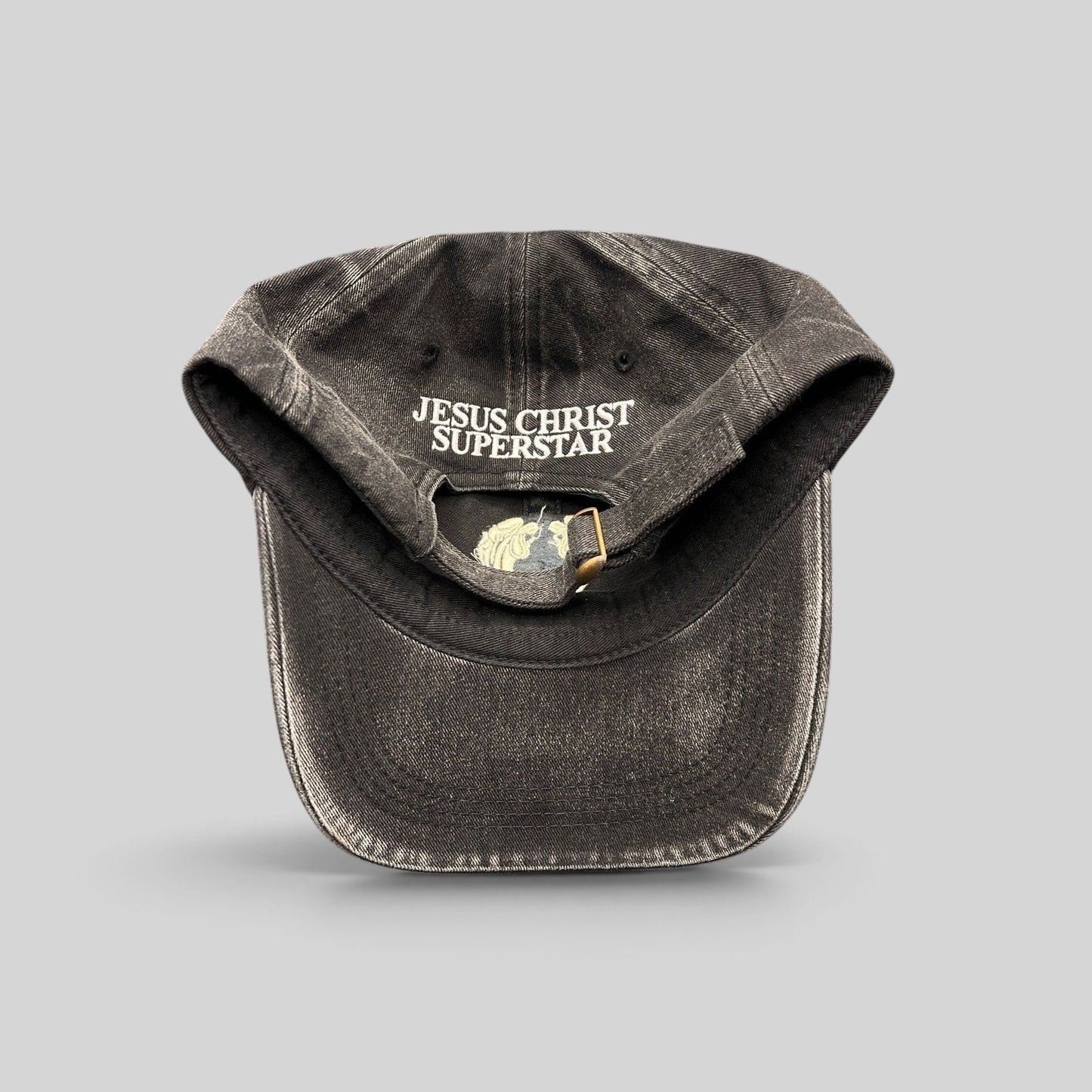 Raree Finds vintage Jesus Christ Superstar black dad hat with adjustable brass buckle and internal logo embroidery