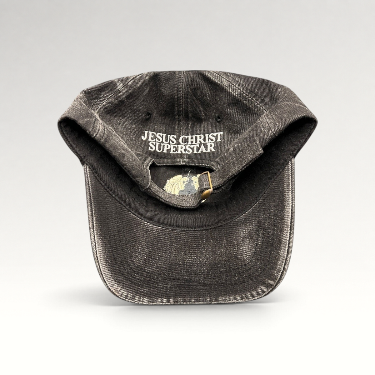 Raree Finds vintage Jesus Christ Superstar black dad hat with adjustable brass buckle and internal logo embroidery