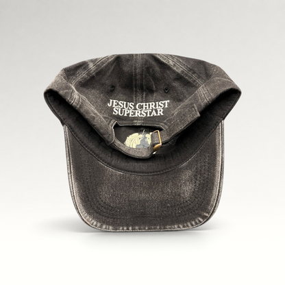 Raree Finds vintage Jesus Christ Superstar black dad hat with adjustable brass buckle and internal logo embroidery