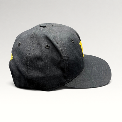 Raree Finds vintage black New Era snapback hat with gold embroidered M logo and structured crown