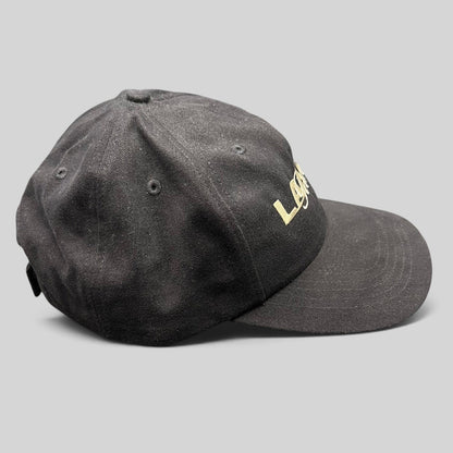 Raree Finds vintage black 100% cotton strapback hat with embroidered Lake Geneva script logo and curved bill