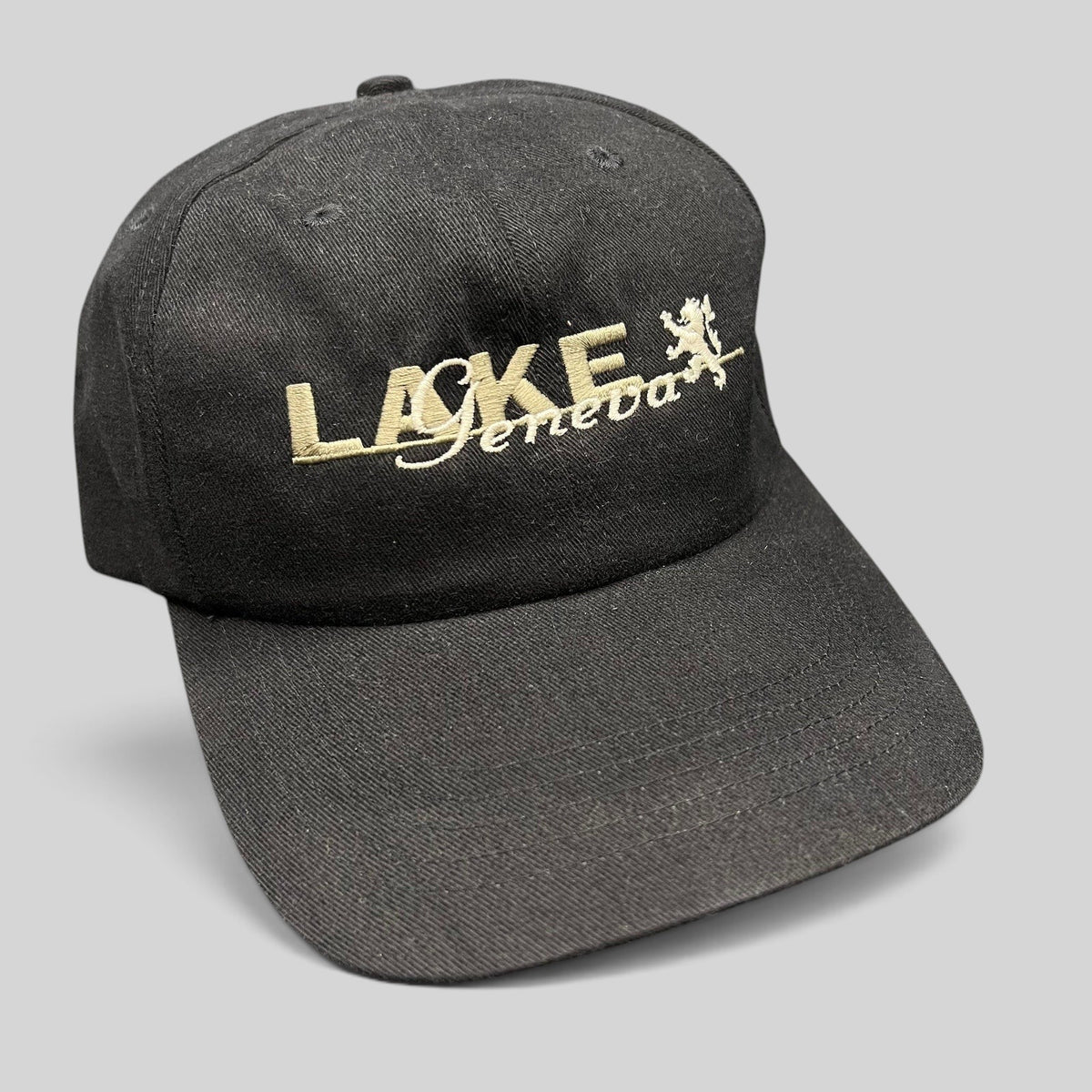Raree Finds vintage black 100% cotton strapback hat by Gear For Sports with Lake Geneva script logo embroidery