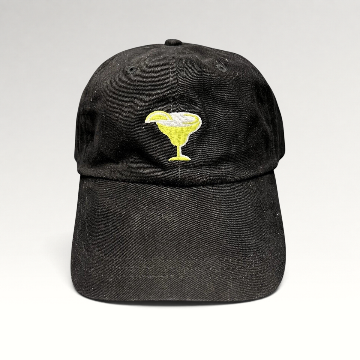 Raree Finds vintage black cotton strapback hat featuring an embroidered yellow margarita glass on the front