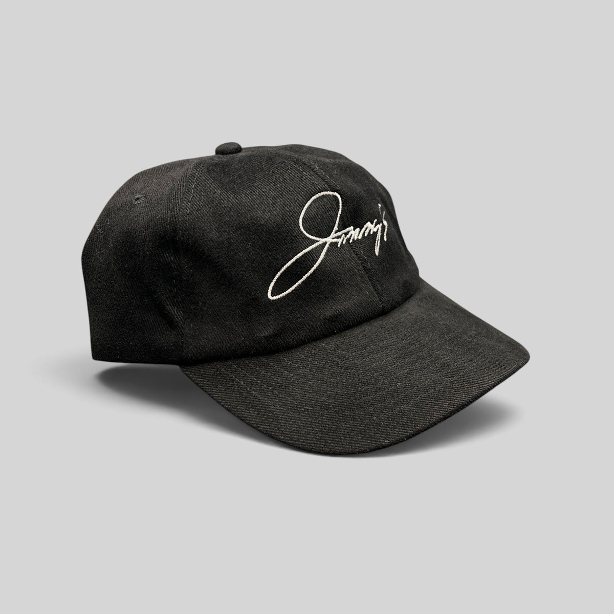 Raree Finds vintage black cotton twill strapback hat featuring white embroidered Jimmy's script logo on front