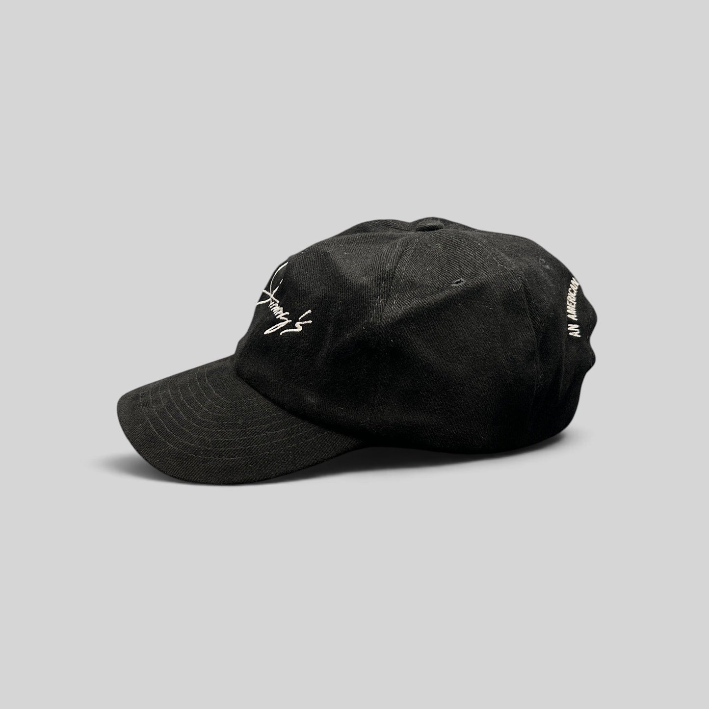 Raree Finds vintage black cotton twill strapback hat with white Jimmy's script logo embroidery and curved brim