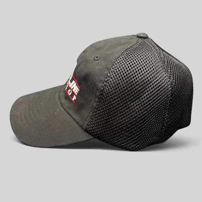 Raree Finds vintage black Incline Ski Shop trucker hat with mesh back and embroidered alpine skier logo side view