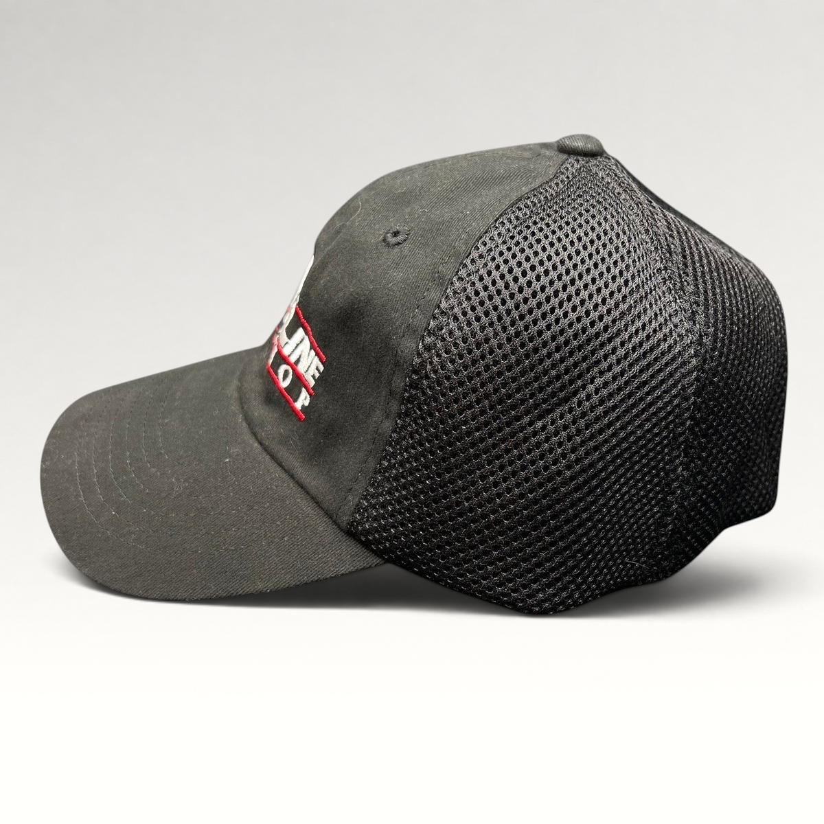Raree Finds vintage black Incline Ski Shop trucker hat with mesh back and embroidered alpine skier logo side view