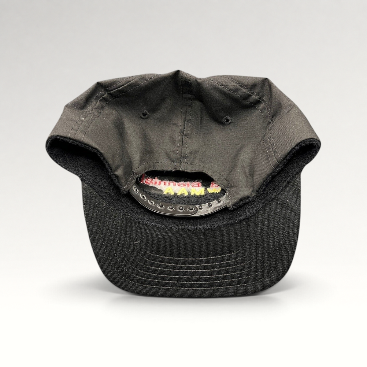 Raree Finds vintage 1993 WMAA Biennial black snapback cap with plastic closure and interior terry cloth sweatband.