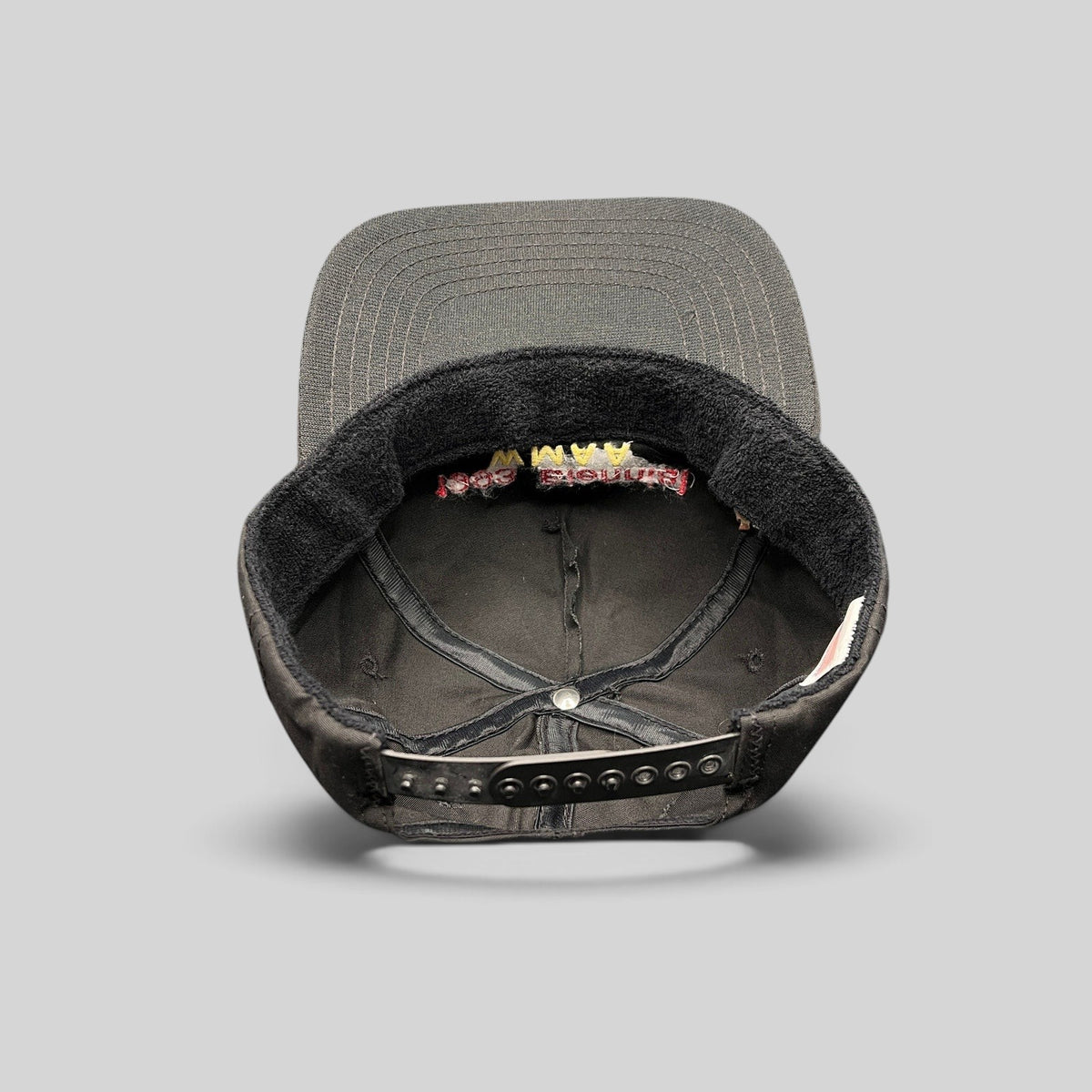 Raree Finds vintage 1993 WMAA Biennial black snapback cap interior view showing terry cloth sweatband and snap closure