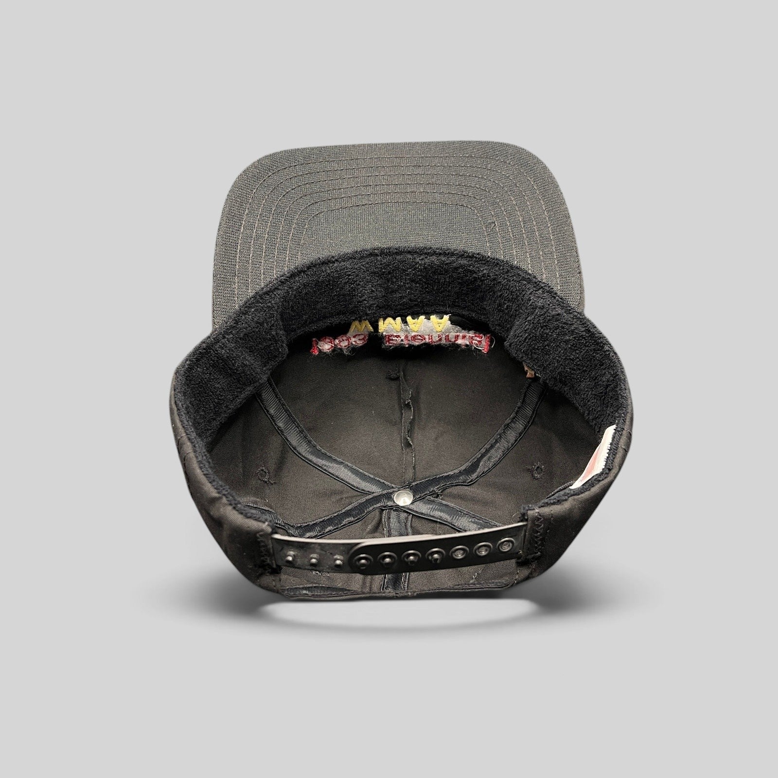 Raree Finds vintage 1993 WMAA Biennial black snapback cap interior view showing terry cloth sweatband and snap closure