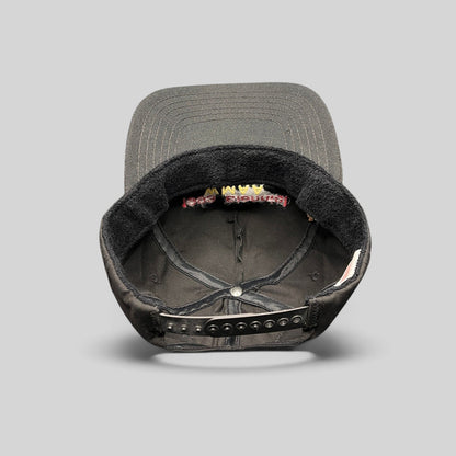 Raree Finds vintage 1993 WMAA Biennial black snapback cap interior view showing terry cloth sweatband and snap closure