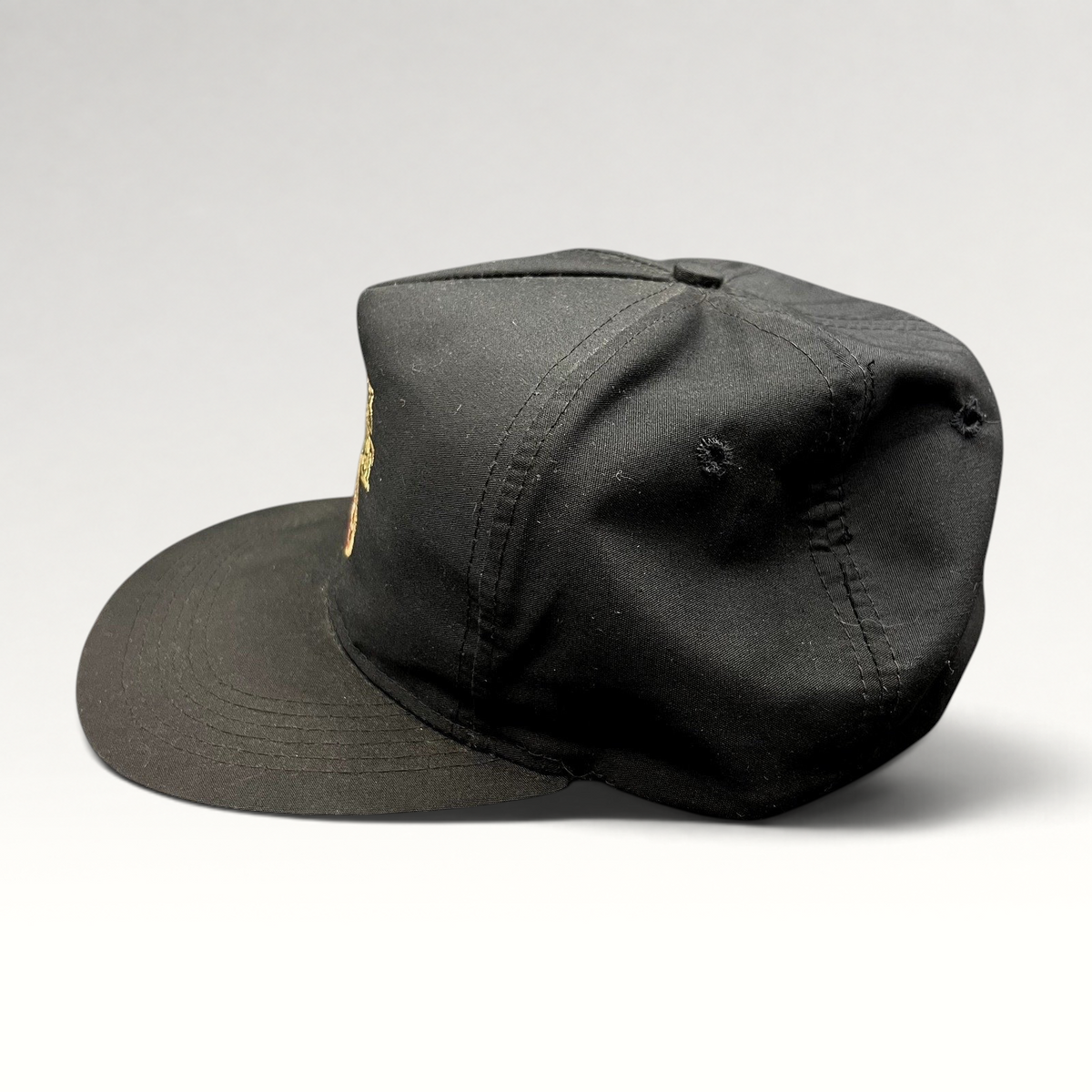 Raree Finds vintage black snapback hat with embroidered Black Velvet whisky logo and high-crown structured design.