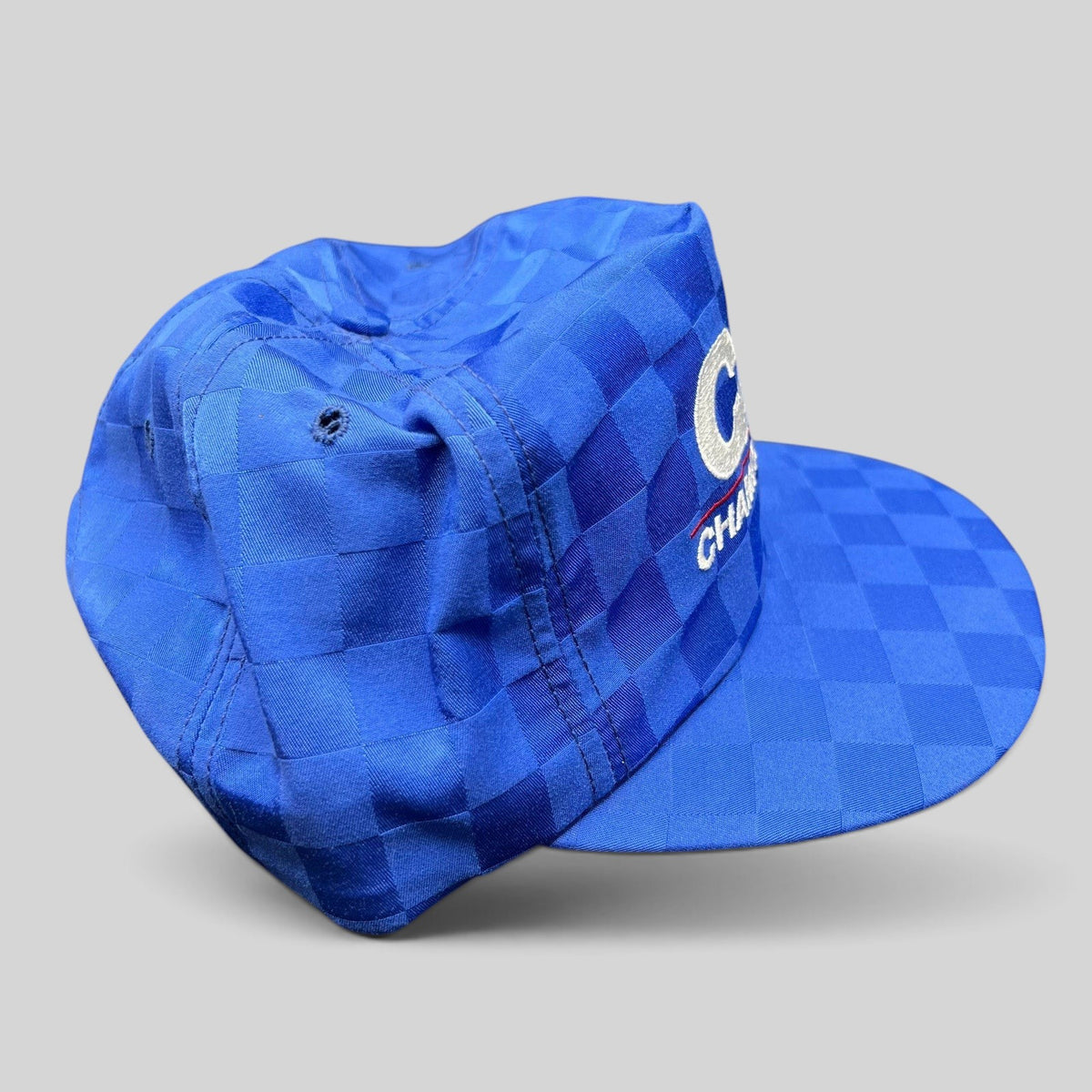 Raree Finds vintage royal blue checkered CAA Championships snapback hat with embroidered lettering and flat bill