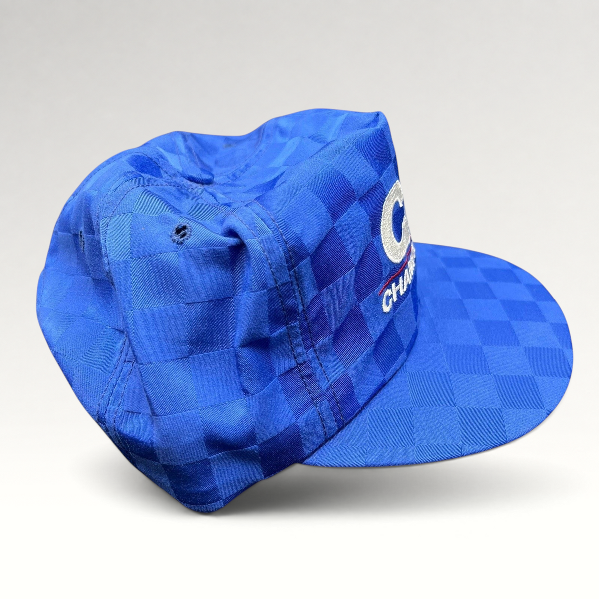 Raree Finds vintage royal blue checkered CAA Championships snapback hat with embroidered lettering and flat bill