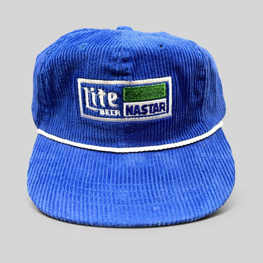 Raree Finds vintage royal blue corduroy strapback hat with Lite Beer and NASTAR embroidered patch and white rope trim.