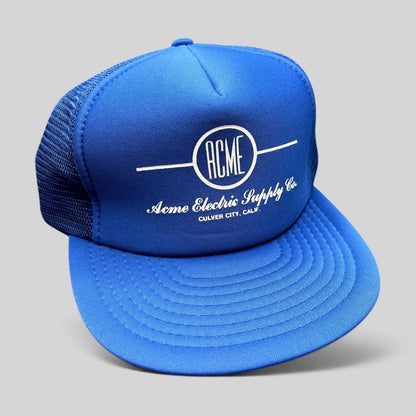 Raree Finds vintage royal blue Acme Electric Supply Co. mesh trucker hat with white graphic and snapback closure.