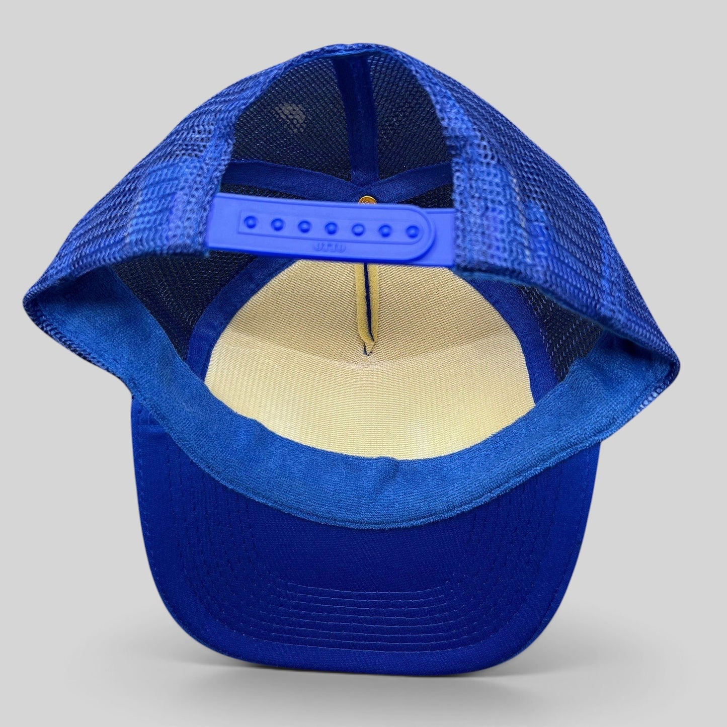 Raree Finds vintage Otto Collection royal blue foam trucker hat with mesh back and adjustable snapback closure