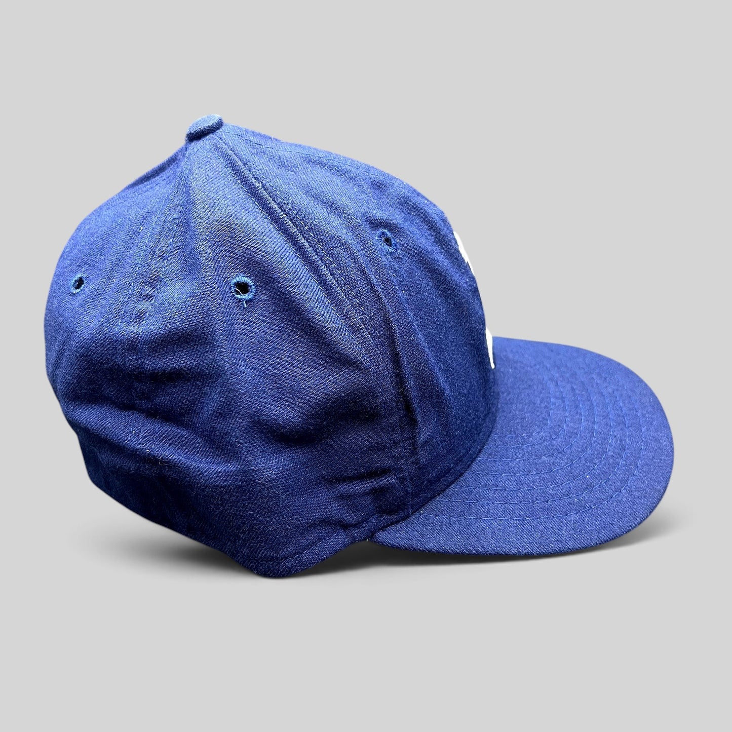 Raree Finds vintage Roman Pro royal blue wool baseball cap with white embroidered A logo and green undervisor