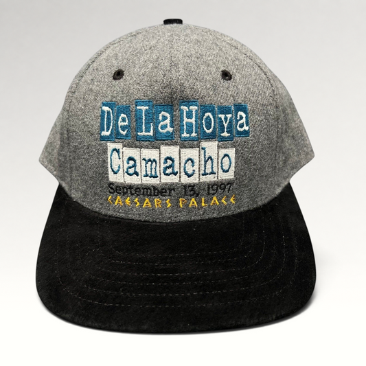 Raree Finds vintage 1997 De La Hoya vs Camacho boxing snapback hat with grey wool crown and black brim.