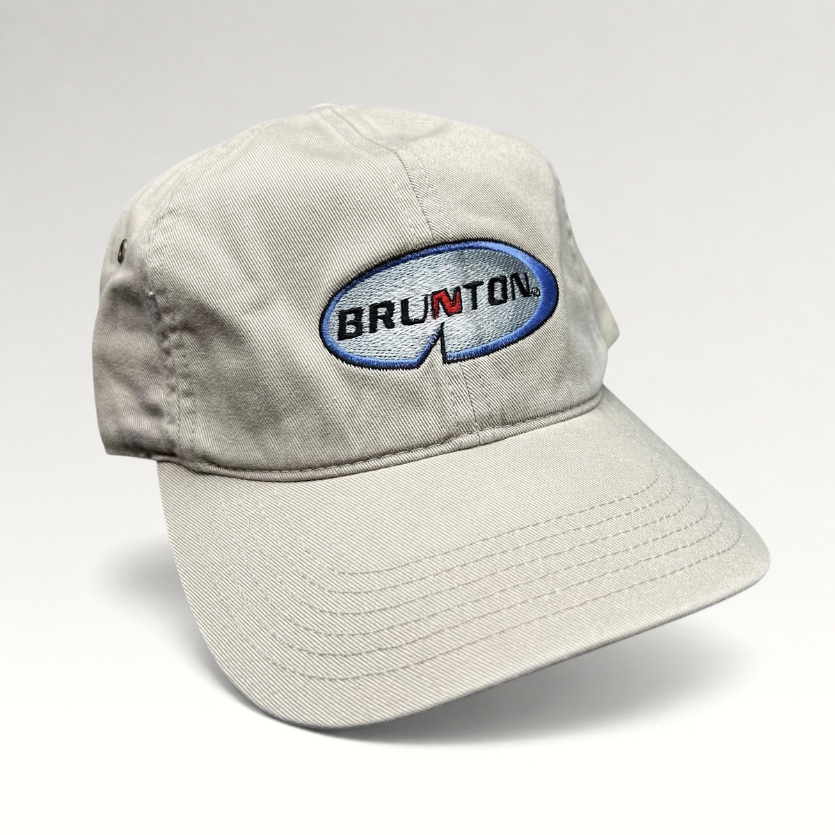 Raree Finds vintage khaki Richardson cotton strapback hat with embroidered Brunton logo and navy underbrim