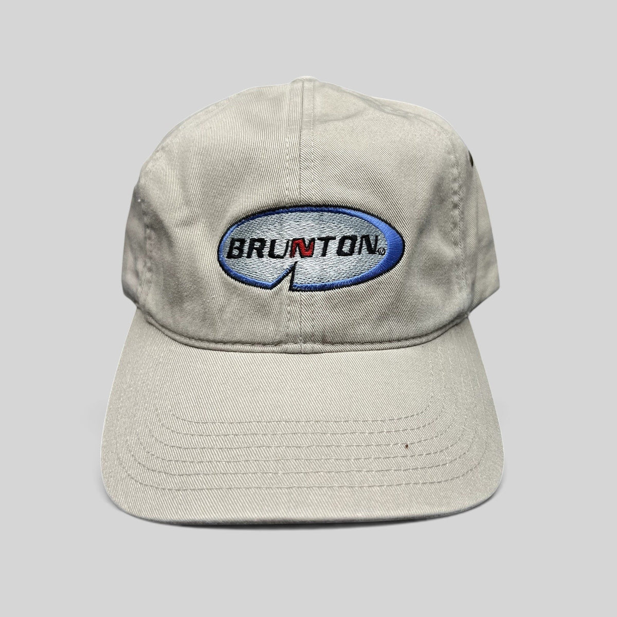 Raree Finds vintage khaki Richardson strapback hat with embroidered Brunton logo and navy underbrim