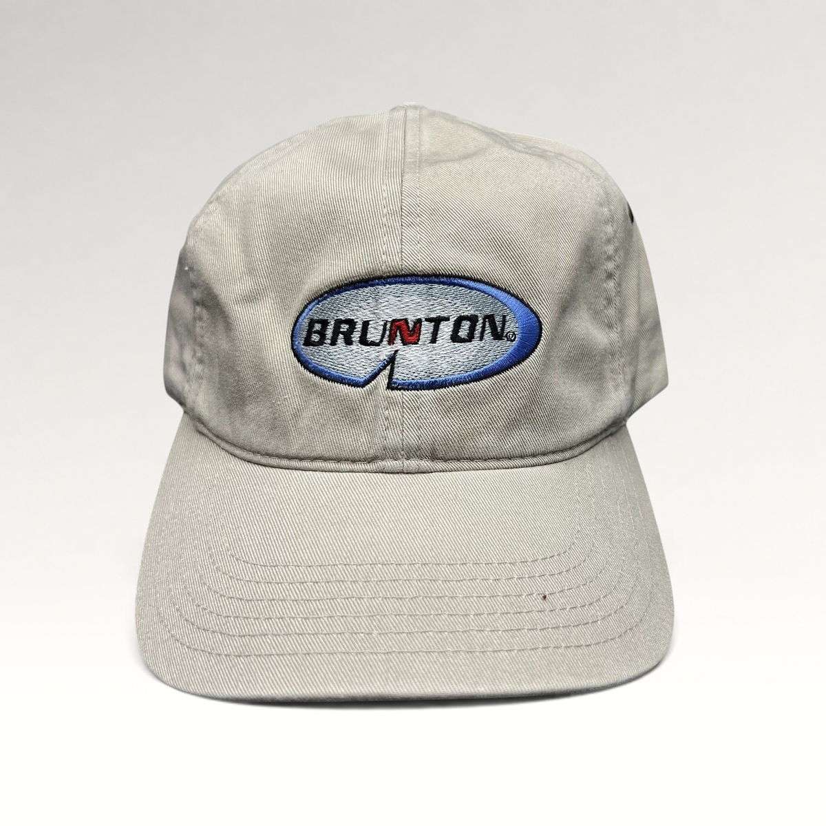 Raree Finds vintage khaki cotton Richardson strapback hat with embroidered Brunton logo and navy underbrim