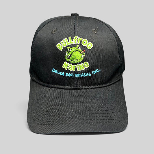 Raree Finds vintage black cotton strapback hat with embroidered Bullfrog Marina frog logo and Delta Ski Beach text.