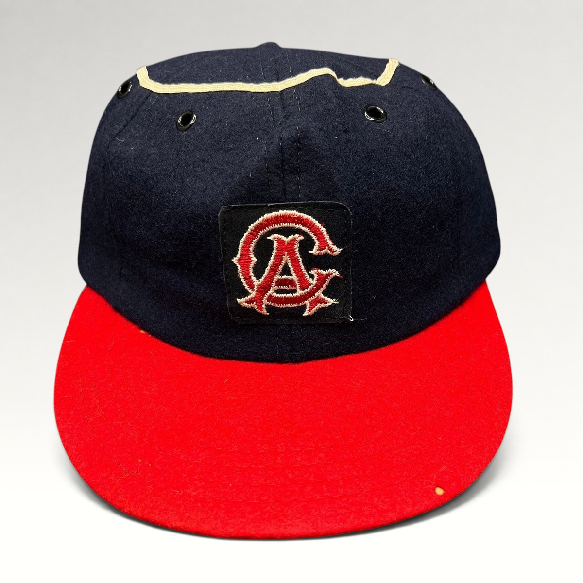 Raree Finds vintage California Angels wool snapback hat with navy crown, red brim, and embroidered CA logo patch.