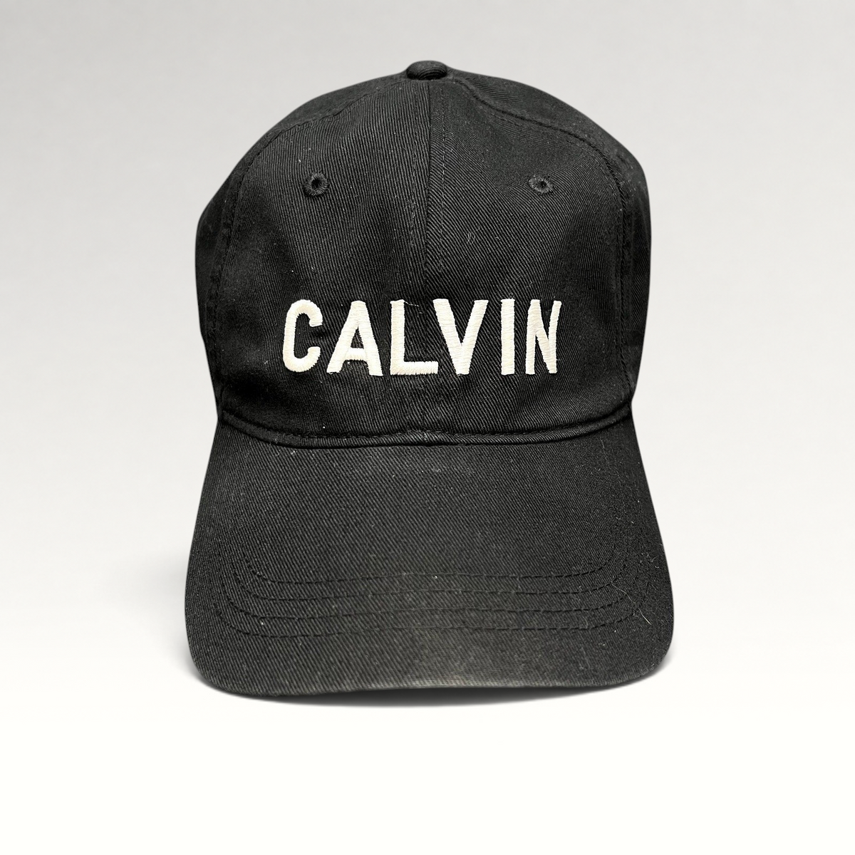 Raree Finds vintage black Calvin Klein strapback hat with white CALVIN embroidery on the front