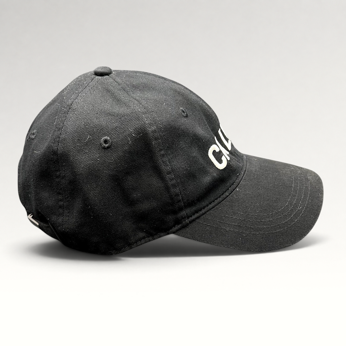 Raree Finds vintage black Calvin Klein strapback hat with white CALVIN embroidery and curved brim