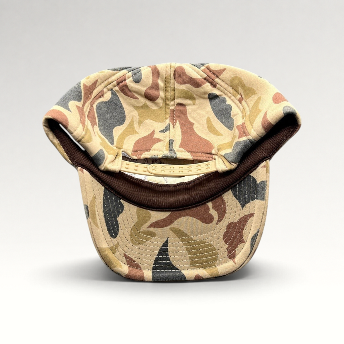 Raree Finds vintage Bonfire Brewing Co camo snapback hat with tan camouflage pattern and brown interior trim