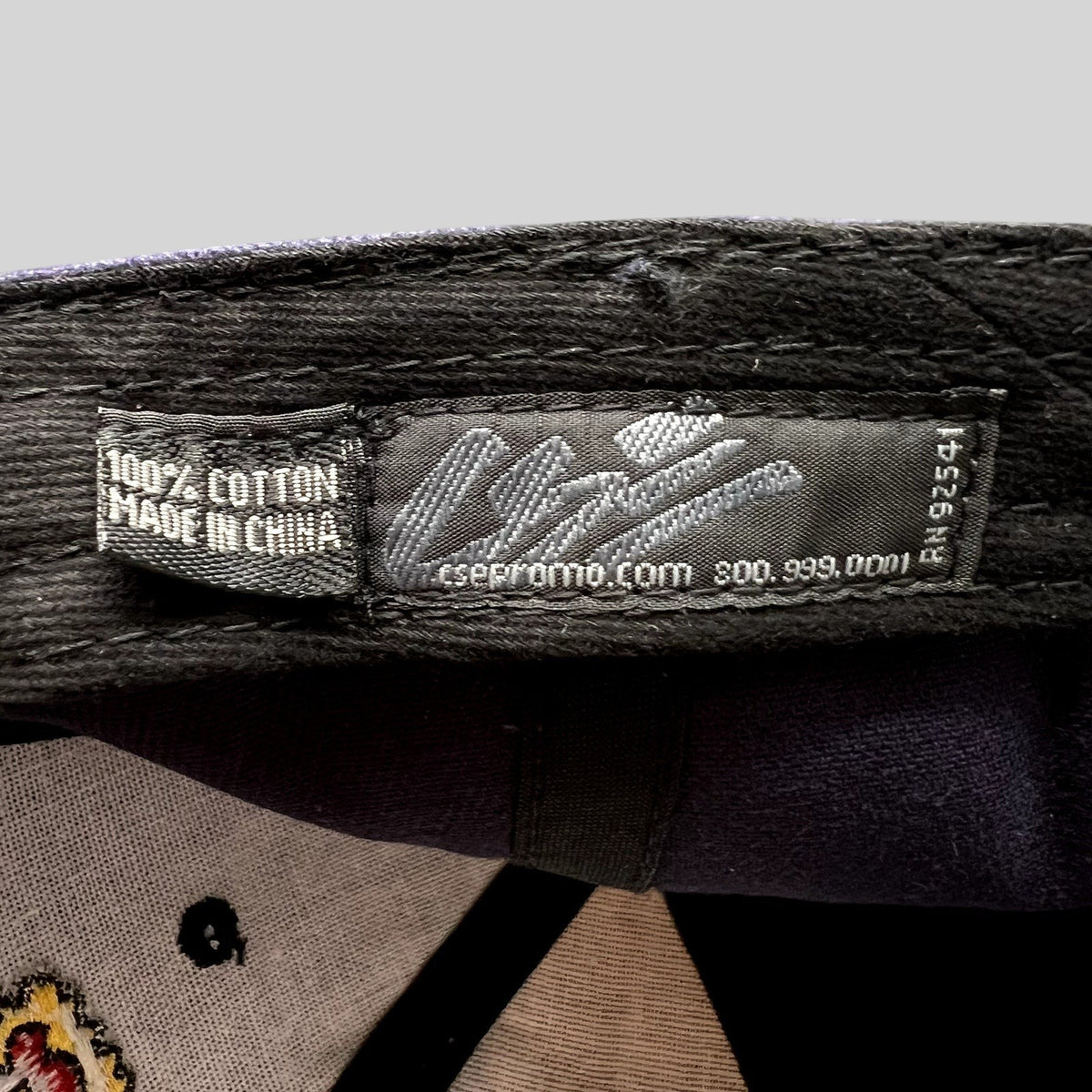 Raree Finds vintage 90s Gold Coast Casino hat interior label showing 100 percent cotton material and branding