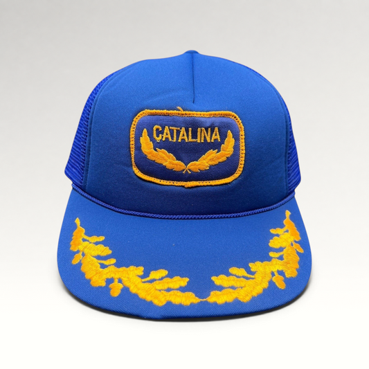 Raree Finds vintage 1980s royal blue foam trucker hat with gold Catalina patch and embroidered laurel brim detail