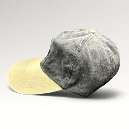 Raree Finds vintage Cobra Caps two-tone charcoal and khaki dad hat with a relaxed unstructured fit and brass buckle.