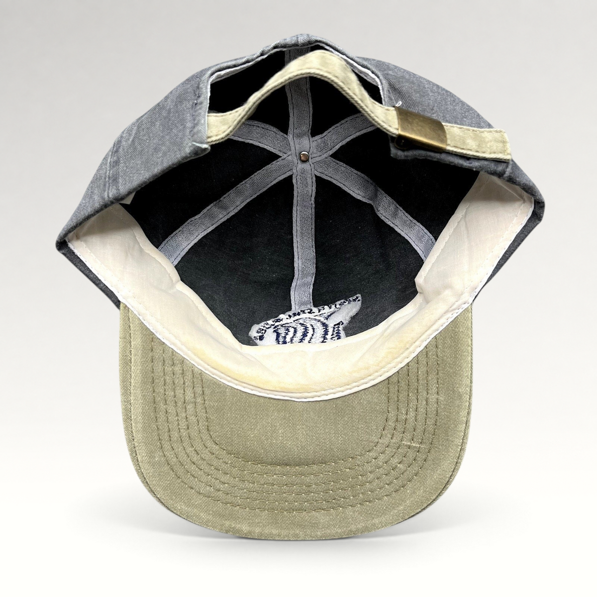 Raree Finds vintage Cobra Caps dad hat in washed charcoal and khaki with brass buckle strapback and interior detail