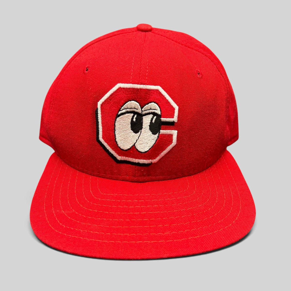 Raree Finds vintage red New Era Chattanooga Lookouts snapback hat featuring the iconic embroidered eyes in C logo.