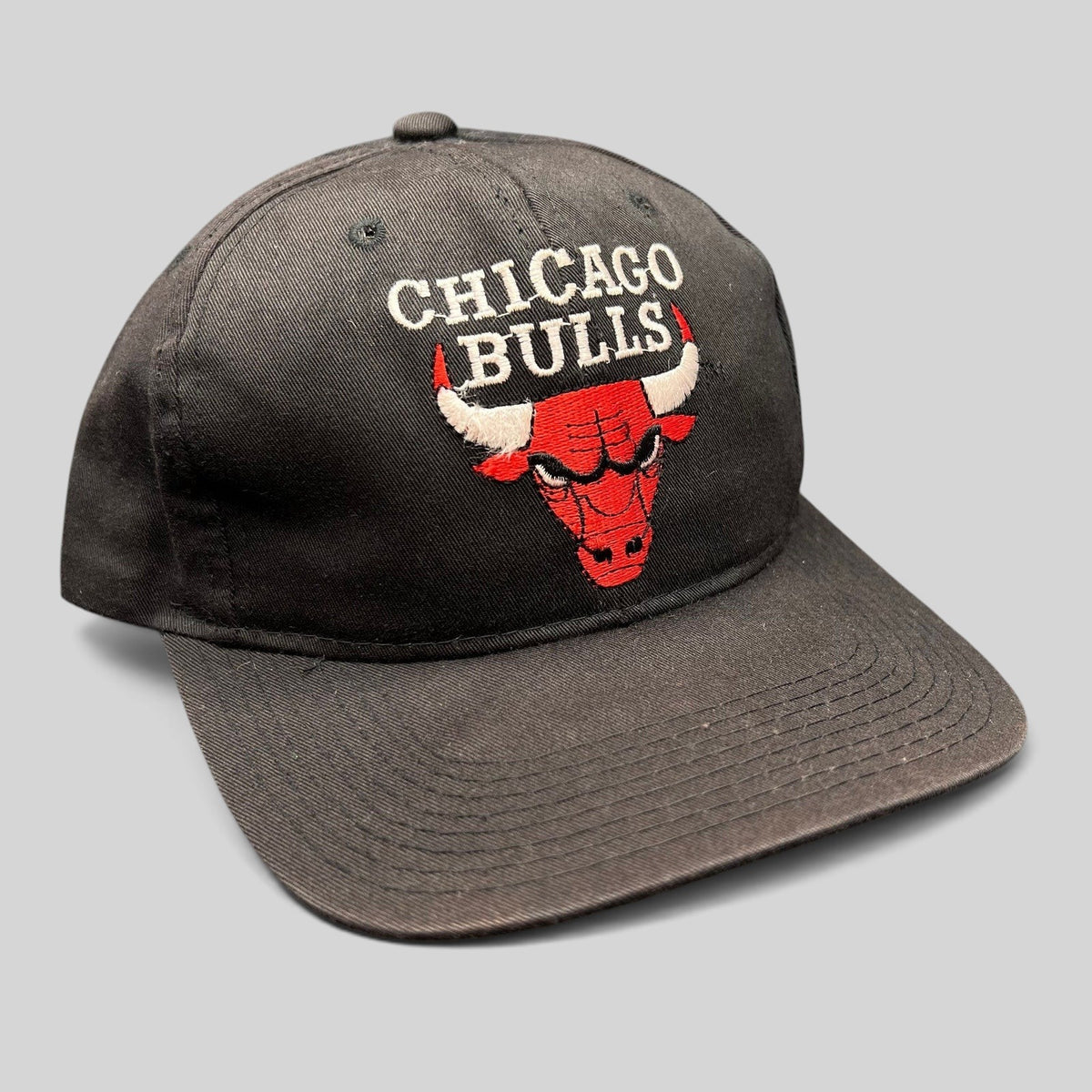 Raree Finds vintage 90s Chicago Bulls AJD snapback hat in black with red embroidered team logo and text