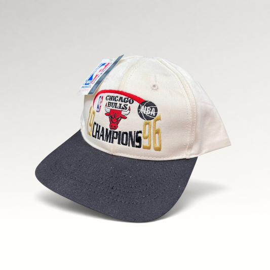 Raree Finds vintage 1996 Chicago Bulls NBA Champions snapback hat with cream crown, black brim, and embroidered logo.