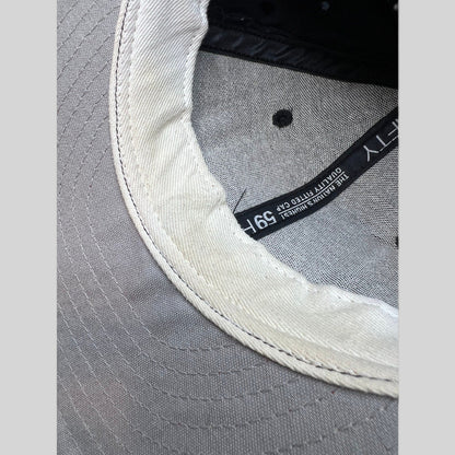 Raree Finds vintage New Era 59FIFTY Cleveland Indians cap interior showing white sweatband and gray undervisor
