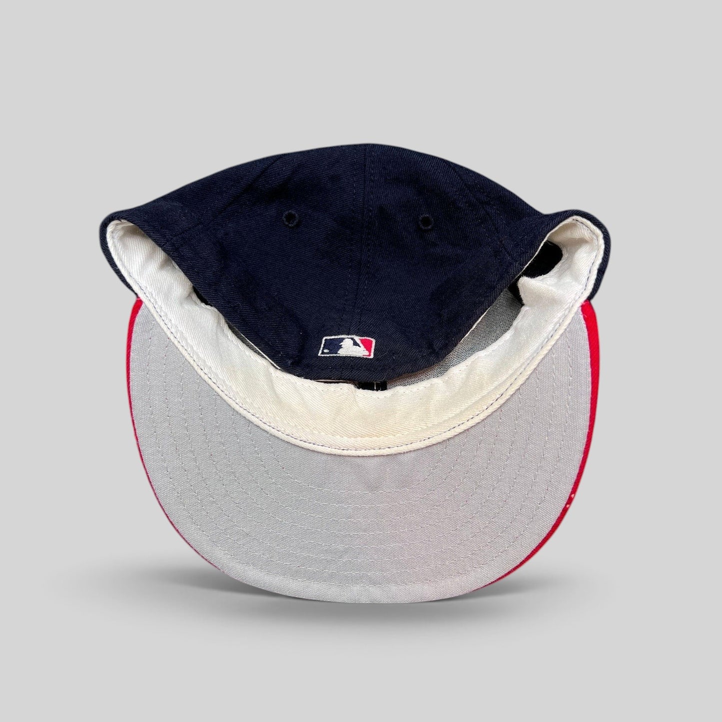 Raree Finds vintage New Era 59FIFTY Cleveland Indians fitted cap showing the gray undervisor and MLB batterman logo