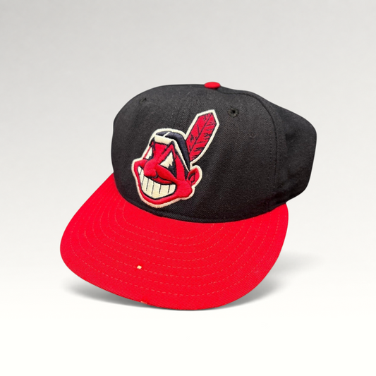 Raree Finds vintage New Era 59FIFTY Cleveland Indians wool cap with red brim and embroidered Chief Wahoo logo