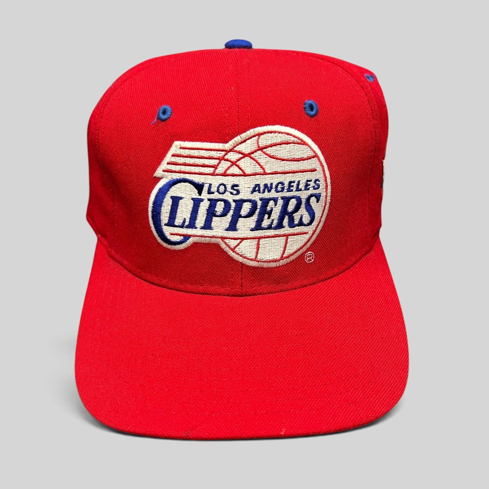 Raree Finds vintage 90s Starter LA Clippers red cap with embroidered script logo and classic basketball graphic