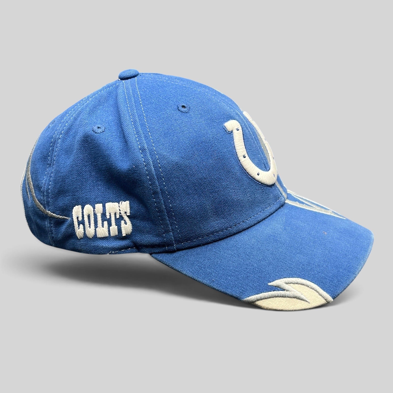 Raree Finds vintage Reebok Indianapolis Colts royal blue and white NFL strapback hat with embroidered team logos.